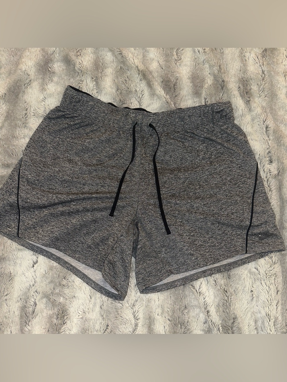 women’s small ‘Nike’ Grey athletic shorts with drawstring waist